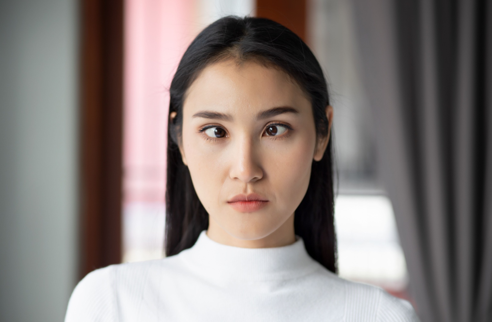 An image of an adult with strabismus.