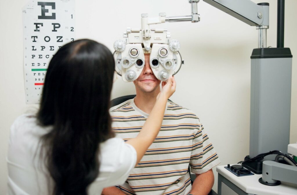A patient receiving an eye exam from an optometrist